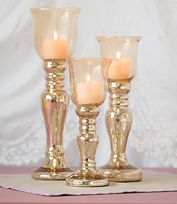 Glass topped gold candle holders